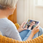 A middle-aged woman is on a video chat.